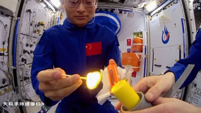 Witness Chinese astronauts conducting a daring open-flame experiment on the Tiangong space station, a risky maneuver forbidden aboard the ISS